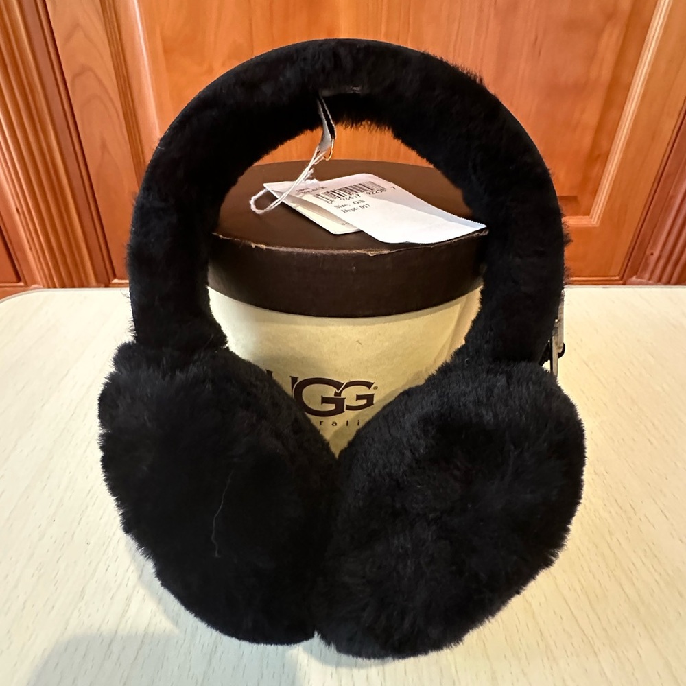 UGG black Classic Shearling and leather earmuffs w/logo . O/S New in box.